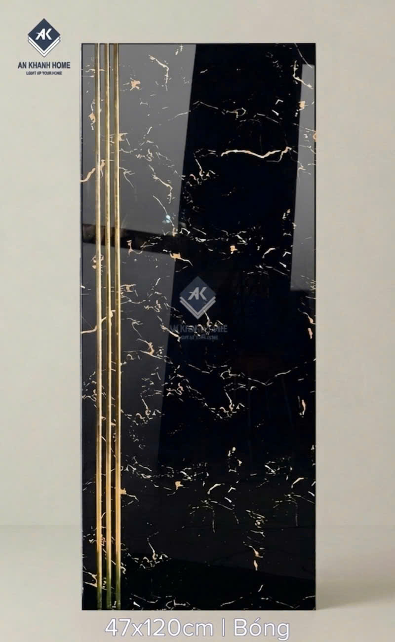 Gạch ốp lát cầu thang vân vàng cam đen khắc kim 47x120cm