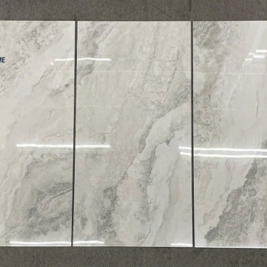 Gạch nhập khẩu Malaysia 60x120 đá xám kem bóng kiếng
