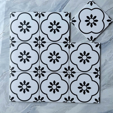 Gạch bông 20x20 màu trắng  hoạ tiết hoa 4 cánh đen bề mặt mờ