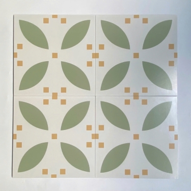 Gạch bông 30x30 màu kem hoạ tiết hoa 4 cánh màu xanh lá non chấm cam