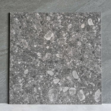 Gạch 60x60 terrazzo đá mài màu xám đậm hạt lớn màu trắng mờ