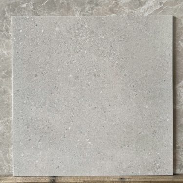 Gạch 60x60 màu xám mix hạt terrazzo đá mài hạt chìm mờ