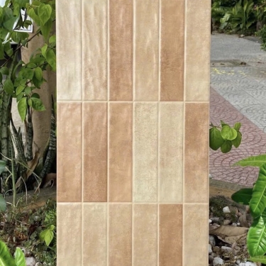 Gạch 30x60 giả thẻ chữ nhật màu vàng nâu hiệu ứng màu ngẫu nhiên bề mặt sóng