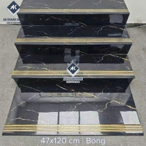 Gạch cầu thang 47x120 đen vân vàng trắng tia chớp khắc kim nhũ vàng