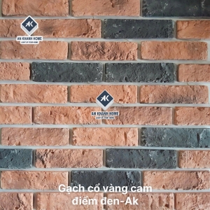Gạch giả cổ chămpa vàng cam điểm đen