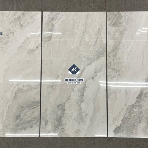 Gạch nhập khẩu Malaysia 60x120 đá xám kem bóng kiếng