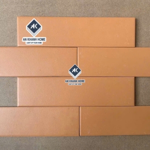 Gạch thẻ giả cổ vàng cam đất 6x24cm trung quốc