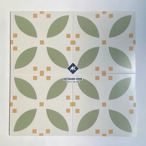 Gạch bông 30x30 màu kem hoạ tiết hoa 4 cánh màu xanh lá non chấm cam