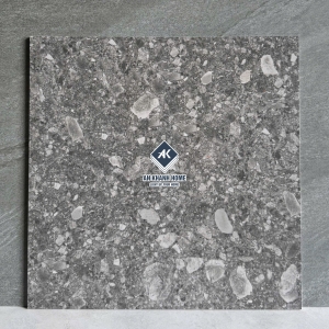 Gạch 60x60 terrazzo đá mài màu xám đậm hạt lớn màu trắng mờ