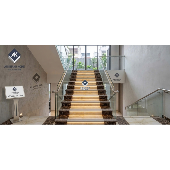 Gạch ốp lát bậc cầu thang 47x100cm vân đá vàng kem nâu đậm