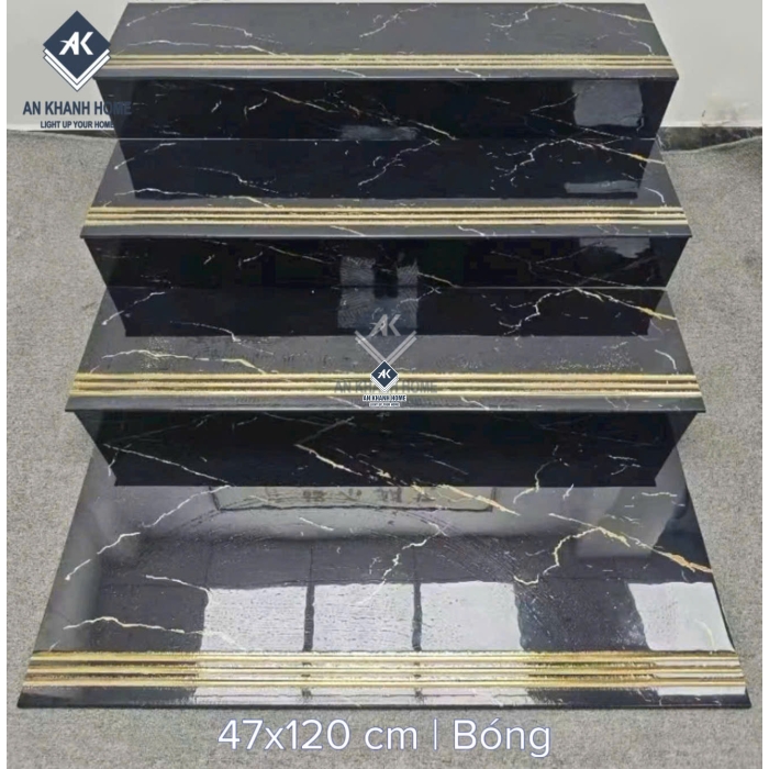 Gạch cầu thang 47x120 đen vân vàng trắng tia chớp khắc kim nhũ vàng