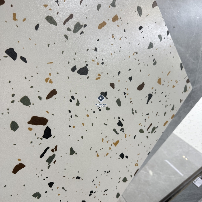Gạch 60x60 terrazzo màu kem hạt màu xanh vàng mờ