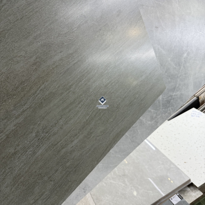 Gạch 60x60 vân travertine màu xám đen mờ mịn baby skin
