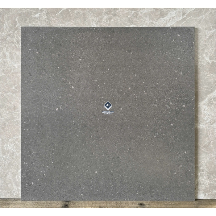Gạch 60x60 màu xám đen mix hạt terrazzo đá mài hạt chìm mờ