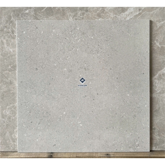 Gạch 60x60 màu xám đen mix hạt terrazzo đá mài hạt chìm mờ