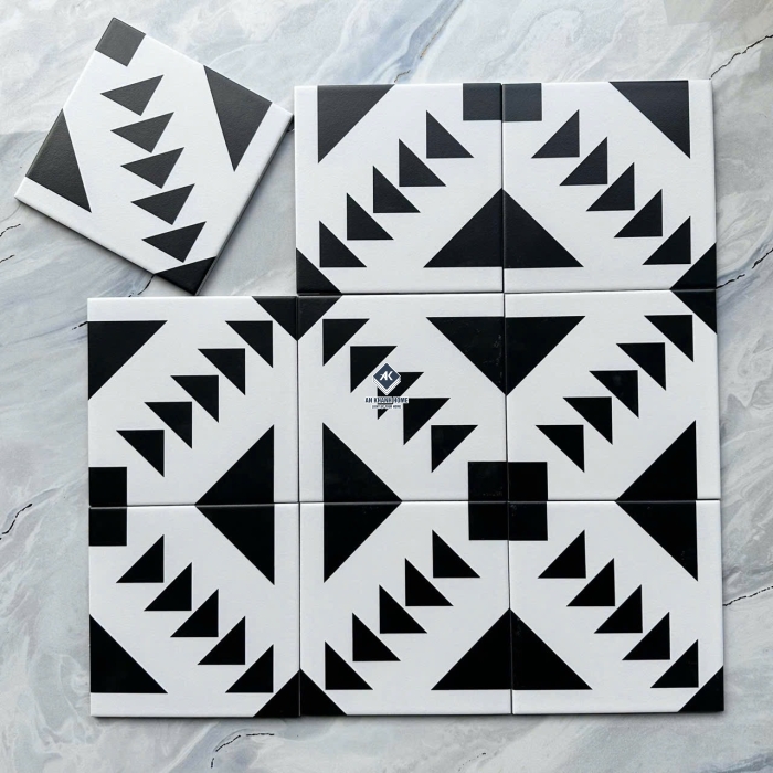Gạch bông 20x20 màu trắng hoạ tiết tam giác màu đen bề mặt mờ